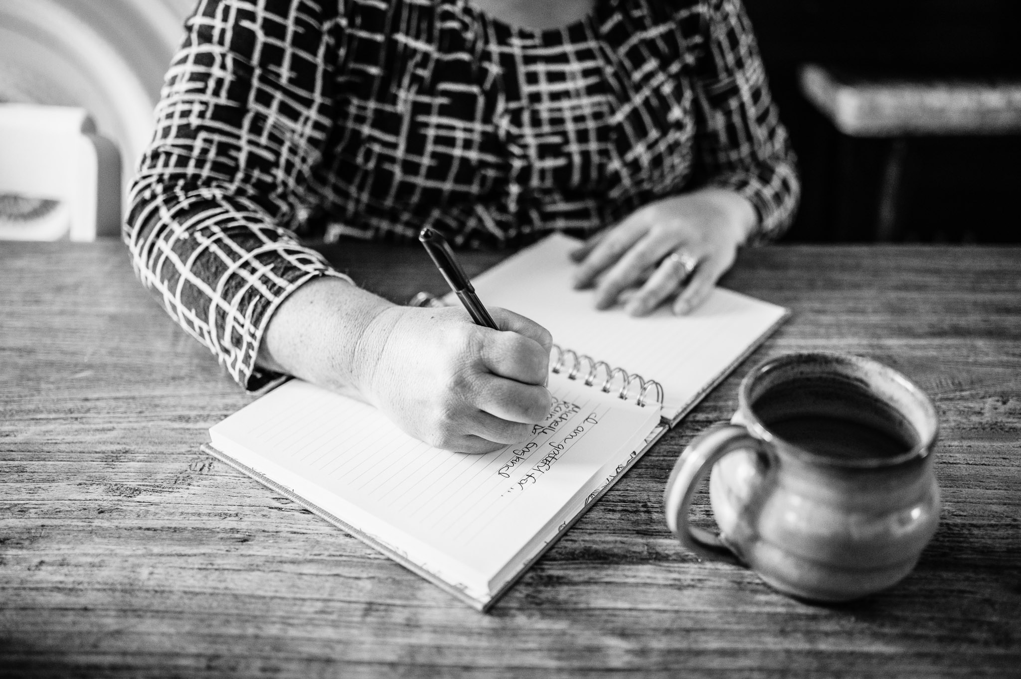 Lisa Galvez writing in her journal